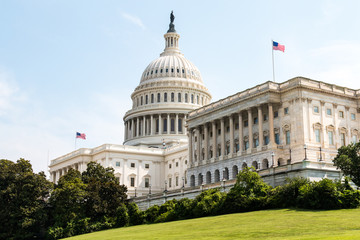 Side view of the U.S. Capitol Building, home of Congress, and located atop Capitol Hill at the...