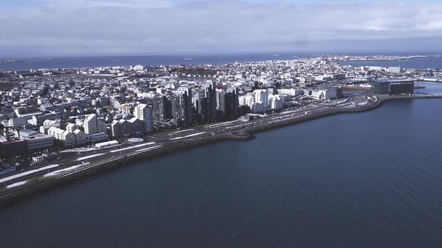Aerial, urban city on coast