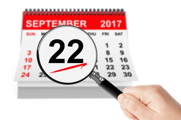 American Business Women's Day Concept. 22 September 2017 Calendar with Magnifier
