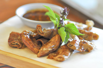 Fototapeta na wymiar grilled chitterlings or roast chitterlings (Thai food)