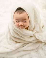 baby with towel