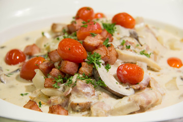  fish with cream sauce and vegetable