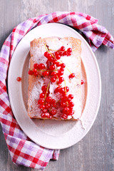 Red currant cake with icing sugar