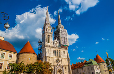 Fototapeta na wymiar Holy Mary pillar and Zagreb Cathedral in ZAGREB, CROATIA