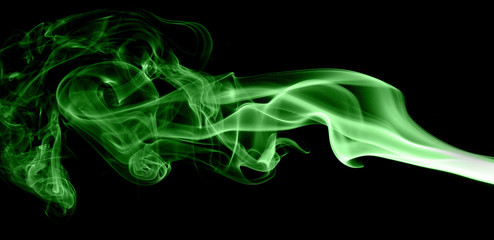 Green smoke on black background