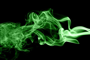 Fototapeta na wymiar Green smoke on black background