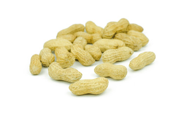 Arranged peanuts peeled and isolated on white background