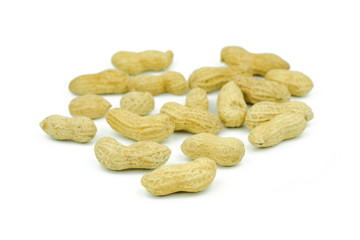 Arranged peanuts peeled and isolated on white background