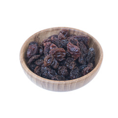 Raisins (Sultanas) in bowl wood isolated on white