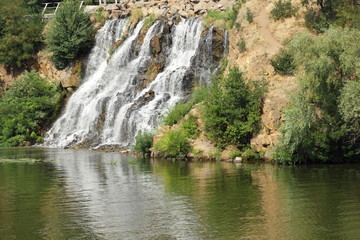 Artificial waterfall of granite boulders