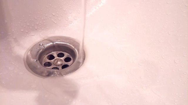 Water goes from the sink