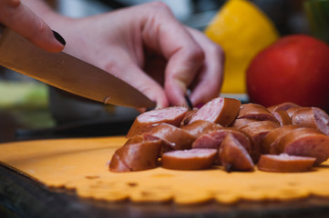 Chopped sausage on a cutting board