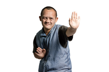 Fototapeta premium Portrait of a senior asian man in the pose of Kung Fu fighter. Isolated on white background with copy space and clipping path