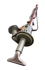 Old retro vacuum cleaner isolated on white background