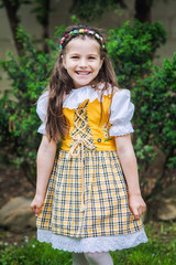 little girl in traditional European folk costume