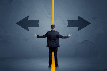 Business person choosing between two options separated by a yellow border arrow