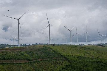 Wind turbine farm on storm day