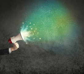 Hand holding megaphone