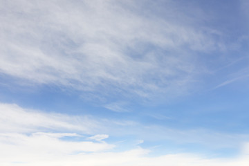 the sky when i am looking through window aircraft during flight in wing with a blue sky.