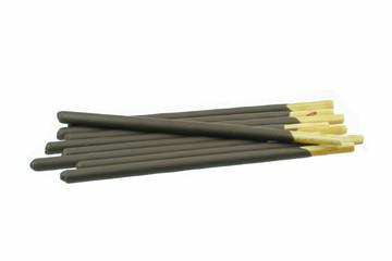 biscuit stick coated with chocolate isolated on white