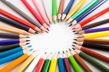 colored pencils lying around the heart