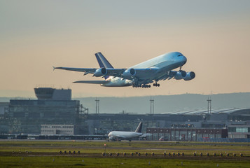Fototapeta na wymiar A380 taking off
