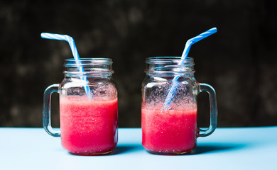 Two jars of healthy watermelon smoothie