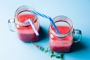 Two jars of healthy watermelon smoothie