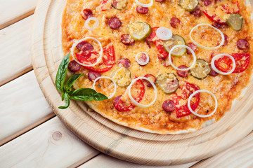 Assorted Pizza on the wooden background