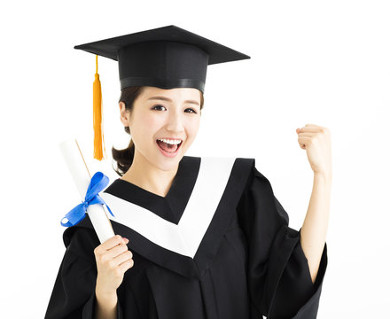 Happy female graduate student holding diploma.
