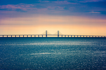 Fototapeta na wymiar Oresund Bridge crossing the Oresund Strait, connecting Copenhagen Denmark and Malmo Sweden