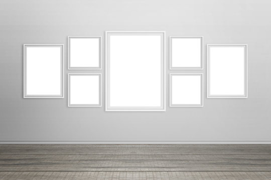 Empty white frames on wall. Isolated for mockup.