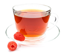 Cup of tea with raspberry isolated