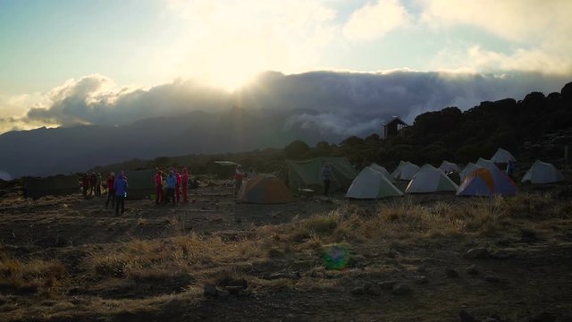 Sunset at Shira Huts Camp, Kilimanjaro. Africa, Tanzania. Kilimanjaro Summit Climb Trip. Sunset from Shira camp. Shira camp on Machame route Mount Kilimanjaro. rainforest in Africa. Jungle sunset