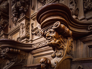 Genial wooden engraved silhouettes and faces in old Abbey Floreffe