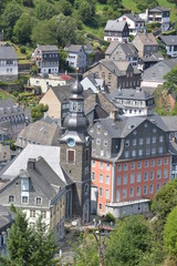 Fototapeta na wymiar Beautiful Monschau in Germany with red house
