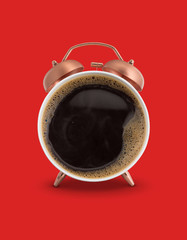 Twin bell alarm clock with coffee mug red background