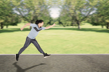 Afro man running on the park