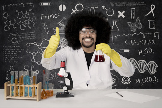 Afro scientist showing OK sign