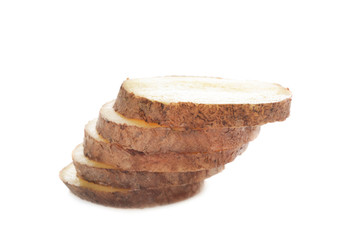 Sliced raw potato on white background