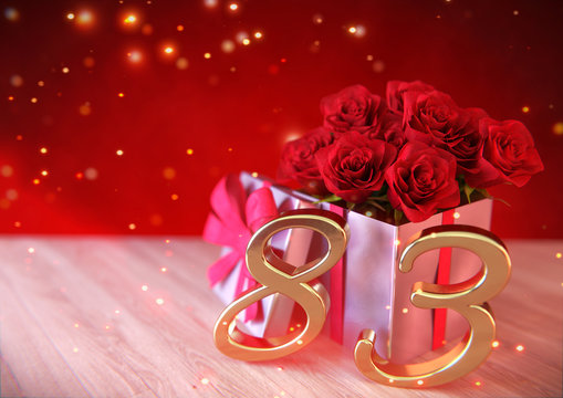 birthday concept with red roses in gift on wooden desk. eighty-third. 83rd. 3D render