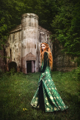 Fototapeta premium Woman in green medieval dress