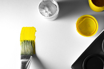 Colorful Paint Brushes with the yellow Colors