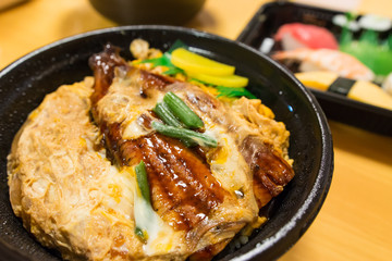 unagi donburi or eel bowl with rice and egg