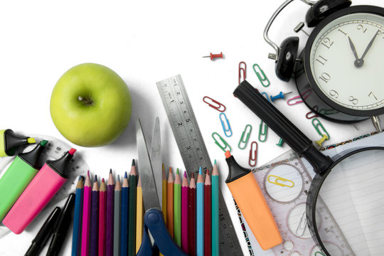 Fresh apple with stationery supplies