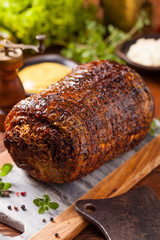 Rolled, roasted pork belly.