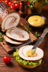 Rolled, roasted pork belly.