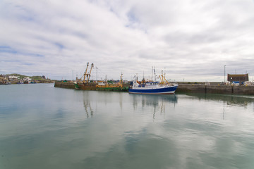 Fototapeta na wymiar Howth harbor in Ireland, boats 