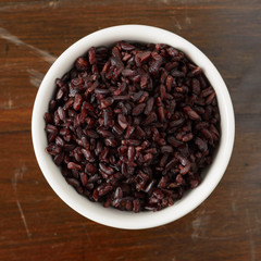 Cooked black rice in bowl