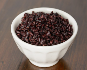 Cooked black rice in bowl